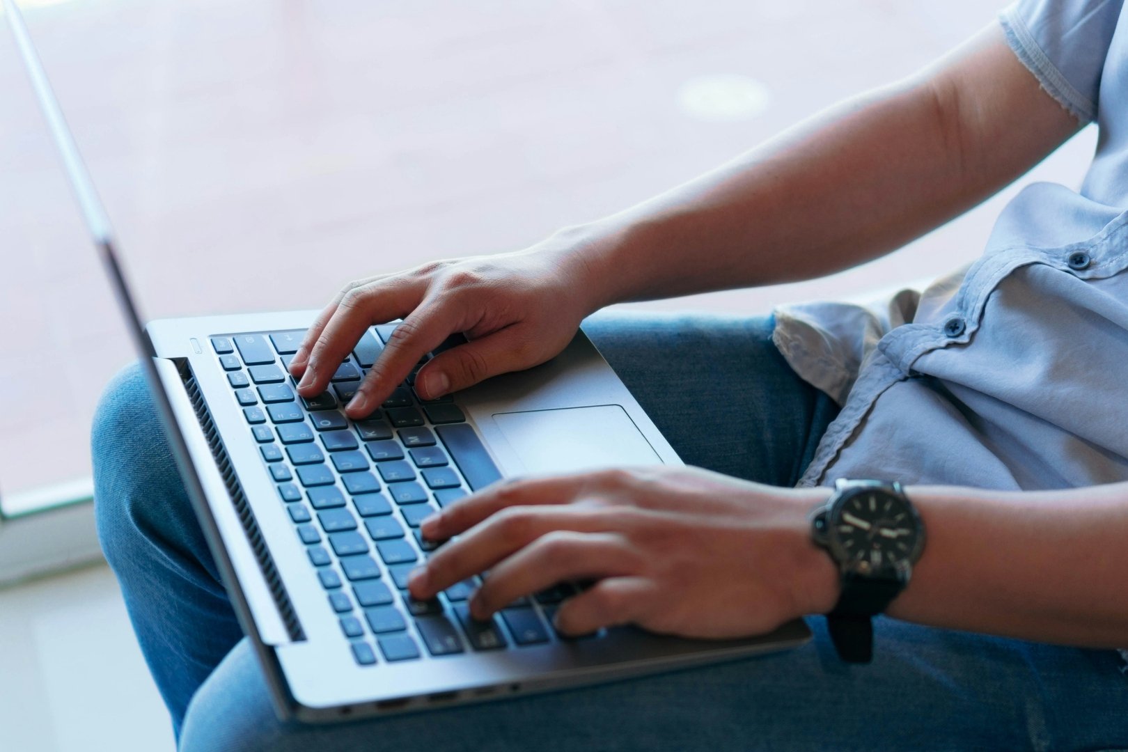 A security professional conducting technical work from a laptop