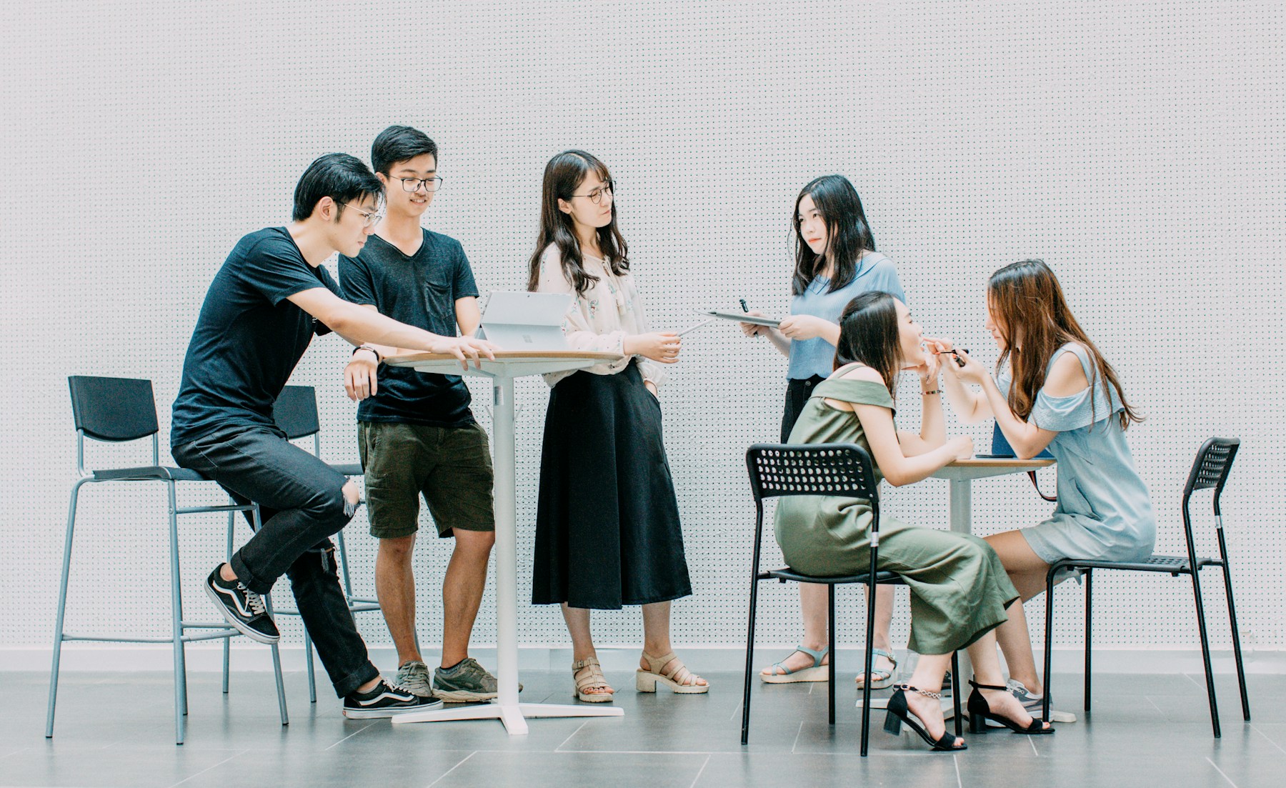 A facilitator leading a practical workplace training session